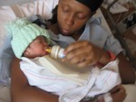 Mommy feeding baby