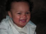 Nicholas smiling close-up on couch - March 2009