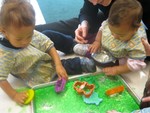 Nate and Akilah playing in jello in Infant2 - january 2011