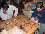 Candice and David working on a 3D puzzle