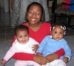 Kina holding Kyersten and Mia