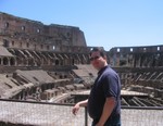 Jason posing in the Roman Colosseum