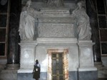 Candice near a pope statue inside St. Peters Basilica