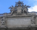 Trevi Fountain Inscription: Does anyone know latin